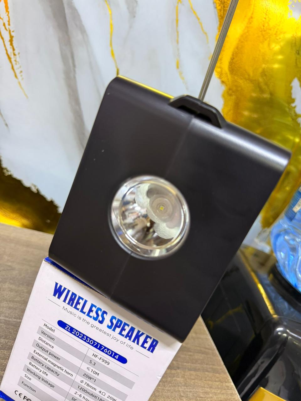 Wireless Music HF-F999 Retro Portable Wireless Speaker : A Multifunctional Party Speaker Built With Integrated Phone Holders and LED light effects.